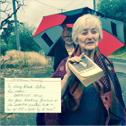 Image of a participant sharing the collection of Gertrude Stein’s writing that she carried on the Walking Library for Women Walking walk in Geelong (Australia),&nbsp;16 November 2017